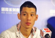 Jeremy Lin #7 of the Houston Rockets listens to during a news conference in Taipei on October 11, 2013