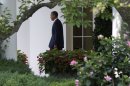 President Barack Obama leaves the White House in Washington, Friday, June 29, 2012, headed for Colorado. (AP Photo/Jacquelyn Martin)