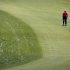 Ernie Els, of South Africa, walks down the first hole during practice for the U.S. Open golf tournament at Merion Golf Club, Wednesday, June 12, 2013, in Ardmore, Pa. (AP Photo/Charlie Riedel)