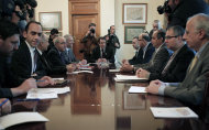 <p>               ADDING NAMES LEFT TO RIGHT - During a crucial top level meeting of Cypriot leaders including from left to right, Presidential Advisor Constantinos Petrides, Labor Minister Harris Georgiades, Greens Party official Adonis Yiangou,  Parliamentary Speaker and EDEK party leader Yiannakis Omirou,  AKEL party chief Andros Kyprianou, Cyprus President Nicos Anastasiades, ruling DISY party deputy leader Averof Neophytou, DIKO party boss Marios Garoyian, EVROKO party leader Demetris Syllouris, Cyprus Central Bank Governor Panicos Demetriades, and Central Bank Deputy Governor Spyros Stavrinakis during a crucial meeting to find an alternative plan to raise 5.8 billion euros to finance a bailout at the Presidential palace in Nicosia Wednesday, March 20, 2013. Cypriot lawmakers have rejected a critical draft bill that would have seized part of people's bank deposits in order to qualify for a vital international bailout. (AP Photo/Petros Giannakouris)