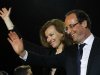 French president-elect Francois Hollande and his companion Valerie Trierweiler wave to supporters after greeting crowds gathered to celebrate his election victory in Bastille Square in Paris, France, Sunday, May 6, 2012. France handed the presidency Sunday to leftist Hollande, a champion of government stimulus programs who says the state should protect the downtrodden - a victory that could deal a death blow to the drive for austerity that has been the hallmark of Europe in recent years. (AP Photo/Francois Mori)