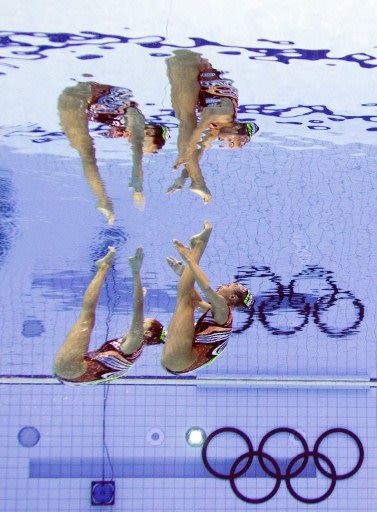 أفضل وأبرز صور اليوم الثاني عشر من الأولمبياد 000-DV1272040-jpg_211840