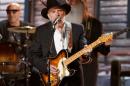 Merle Haggard performs at the 56th annual Grammy Awards in Los Angeles