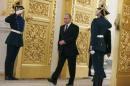 Putin attends a ceremony in Moscow
