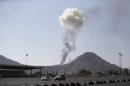 Smoke rises from an army weapons depot hit by a Saudi-led air strike in al-Nahdain mountain in Yemen's capital Sanaa