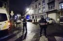 Belgian police block a street in central Verviers where Belgian counter-terrorist police raided an apartment