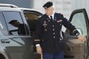 Lead prosecutor, U.S. Army Col. Michael Mulligan, arrives at the Lawrence H. Williams Judicial Center as proceedings in the court martial of U.S. Army Maj. Nidal Malik Hasan continue, Thursday, Aug. 22, 2013, in Fort Hood, Texas. (AP Photo/Tony Gutierrez)