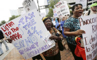 Demonstrators march, in Tampa, Fla., Sunday, Aug. 26, 2012. Hundreds of protestors gathered in Gas Light Park in downtown Tampa to march in demonstration against the Republican National Convention. (AP Photo/Dave Martin)