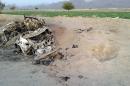 This photo taken by a freelance photographer Abdul Salam Khan using his smart phone on Sunday, May 22, 2016, purports to show the destroyed vehicle in which Mullah Mohammad Akhtar Mansour was traveling in the Ahmad Wal area in Baluchistan province of Pakistan, near Afghanistan's border. A senior commander of the Afghan Taliban confirmed on Sunday that the extremist group's leader, Mullah Mohammad Akhtar Mansour, has been killed in a U.S. drone strike. (AP Photo/Abdul Salam Khan)