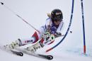 Switzerland's Lara Gut speeds down the course during the women's World Cup giant slalom ski race Friday, Nov. 27, 2015, in Aspen, Colo. (AP Photo/Nathan Bilow)