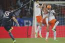 Paris Saint Germain's Zlatan Ibrahimovic, left, takes a free kick over the wall during his French League one soccer match against Montpellier , Saturday, May. 17, 2014, at the Parc des Princes stadium, in Paris, France. (AP Photo/Jacques Brinon)