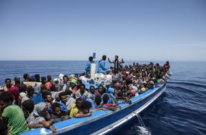 Migrants travel on a wooden boat on the Mediterranean&nbsp;&hellip;