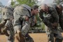 Handout photo shows Then U.S. Army First Lieutenant Kirsten Griest participating in combatives training during the Ranger Course on Fort Benning