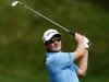 Justin Rose of England watches his second shot on the 15th hole during the third round of the Memorial Tournament at Muirfield Village Golf Club in Dublin