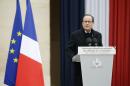 French President Francois Hollande delivers a speech during a ceremony on November 27, 2015 at the Hotel des Invalides to honour the victims of the Paris attacks