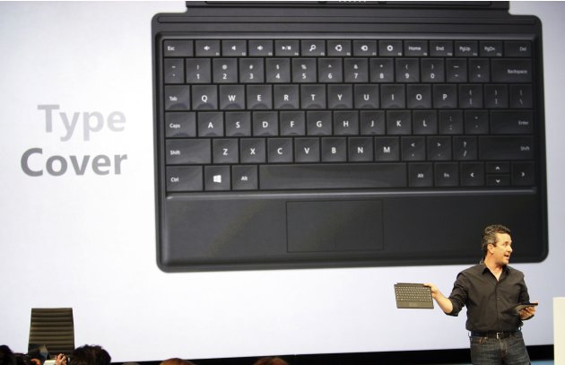 Michael Angiulo holds the new Surface tablet computer and keyboard during his presentation as it is unveiled in Los Angeles