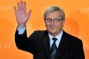 Luxembourg prime minister Jean-Claude Juncker waves to supporters at the Alvisse Hotel in Luxembourg on October 20, 2013 in Luxembourg