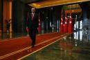 Turkey's President Tayyip Erdogan leaves an official ceremony to mark Republic Day at the new Presidential Palace in Ankara