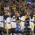 Wichita State players smile and applaud as their team scored against La Salle during the first half of a West Regional semifinal in the NCAA men's college basketball tournament, Thursday, March 28, 2013, in Los Angeles. (AP Photo/Jae C. Hong)