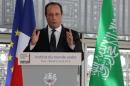 French President Hollande inaugurates an exhibition on the Haj, the Islamic pilgrimage to Mecca, at the Institut du Monde Arabe in Paris