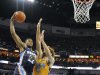 Memphis Grizzlies forward Rudy Gay (22) shoots over New Orleans Hornets center Robin Lopez (15) in the first half of an NBA basketball game in New Orleans, Friday Dec 7, 2012. (AP Photo/Stacy Revere)
