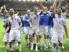 Greece's players celebrate victory against Russia after their Group A Euro 2012 soccer match at National stadium in Warsaw
