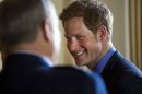 Britain's Prince Harry greets attendees before a reception in the Prince's honor at the Ambassador's residence in Washington, Thursday, May 9, 2013. (AP Photo/Jim Lo Scalzo, Pool)