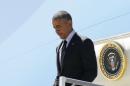 U.S. President Obama disembarks from Air Force One as he arrives at Los Angeles International Airport