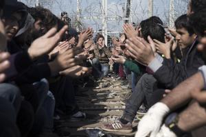 Refugees and migrants chant slogans as they protest&nbsp;&hellip;