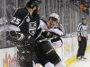 Los Angeles Kings left wing Dustin Penner (25) collides with New Jersey Devils defenseman Marek Zidlicky (2) in the first period during Game 3 of the NHL hockey Stanley Cup finals, Monday, June 4, 2012, in Los Angeles. (AP Photo/Mark J. Terrill)
