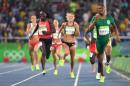 South Africa's Caster Semenya (R) crosses the finish line to win the Women's 800m Final