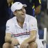 Andy Roddick reacts as rain forces a delay in  his match against  Argentina's Juan Martin Del Potro in the quarterfinals of the 2012 US Open tennis tournament,  Tuesday, Sept. 4, 2012, in New York. (AP Photo/Charles Krupa)
