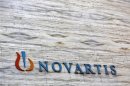 A Novartis logo is pictured on its headquarters building in Mumbai April 1, 2013