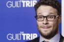 Rogen, star of the new film "The Guilt Trip" poses as he arrives at the film's premiere in Los Angeles