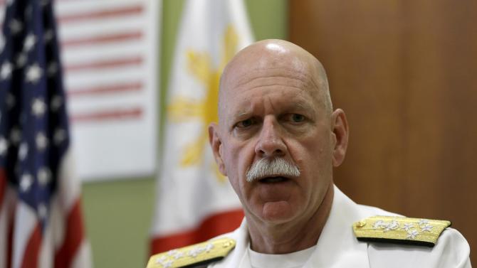 U.S. Pacific Fleet Commander Adm. Scott Swift talks during an interview with journalists Friday, July 17, 2015 in Manila, Philippines. The new U.S. commander of the Pacific Fleet has assured allies that American forces are well-equipped and ready to respond to any contingency in the South China Sea, where long-seething territorial disputes have set off widespread uncertainties. (AP Photo/Bullit Marquez)