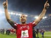 Australia's Queensland Reds Quade Cooper celebrates after winning the Super rugby final against New Zealand's Canterbury Crusaders in Brisbane