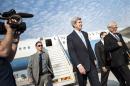 U.S. Secretary of State John Kerry walks upon his arrival at Ben Gurion Airport near Tel Aviv