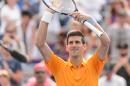 Novak Djokovic of Serbia celebrates his victory against Jeremy Chardy of France during day six of the Rogers Cup, August 15, 2015, in Montreal, Canada