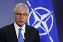U.S. Defense Secretary Chuck Hagel addresses a news conference during a NATO defence ministers meeting at the Alliance headquarters in Brussels