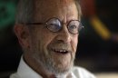 FILE - In this Monday, Sept. 17, 2012 file photo, Author Elmore Leonard, 86, smiles during an interview at his home in Bloomfield Township, Mich. Leonard, a former adman who later in life became one of America's foremost crime writers, has died. He was 87. His researcher says he passed away Tuesday morning, Aug. 20, 2013 from complications from a stroke. (AP Photo/Paul Sancya)