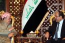 One step toward stability? More talks like this September meeting between Iraqi Prime Minister Nuri al-Maliki (R) and Iraqi Kurdish President Masoud Barzani.
