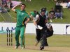 New Zealand's de Boorder runs as Abbott lines up a shy at the stumps during a warm up T20 cricket match against South Africa A in Pietermaritzburg