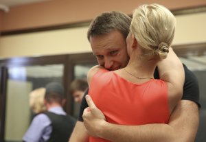 Russian opposition leader Alexei Navalny, embraces …