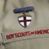 This photo taken  Monday, Feb. 4, 2013, shows a close up detail of a Boy Scout uniform worn by Brad Hankins, a campaign director for Scouts for Equality, as he responds questions during a news conference in front of the Boy Scouts of America headquarters in Irving, Texas. The Boy Scouts of America's policy excluding gay members and leaders could be up for a vote as soon as Wednesday, when the organization's national executive board meets behind closed doors under intense pressure from several sides. (AP Photo/Tony Gutierrez)