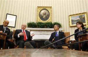 U.S. President Obama listens to his Yemeni counterpart Hadi during a meeting in Washington