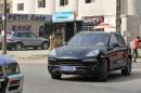 A picture taken on December 19, 2013 shows a Porsche Cayenne car on a street in the Ivorian capital of Abidjan