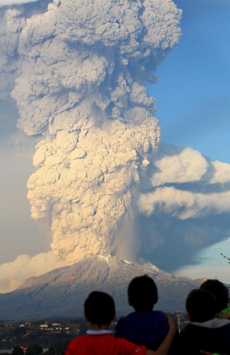Smoke and ash rise from the Calbuco volcano, seen from Puerto Varas city