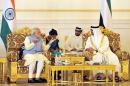 In this handout photo released by the Indian Press Information Bureau (PIB) on August 16, 2015, India's Prime Minister Narendra Modi (L) speaks with the Crown Prince of Abu Dhabi, Sheikh Mohammed bin Zayed al-Nahyan, during a meeting in Abu Dhabi