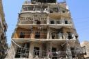A view shows a damaged building in Tariq al-Bab neighborhood of Aleppo