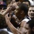 Penn State's Jermaine Marshall (11) is greeted by fans at the end of an NCAA college basketball game against Michigan in State College, Pa., Wednesday, Feb. 27, 2013. Penn State won 84-78. (AP Photo/Ralph Wilson)